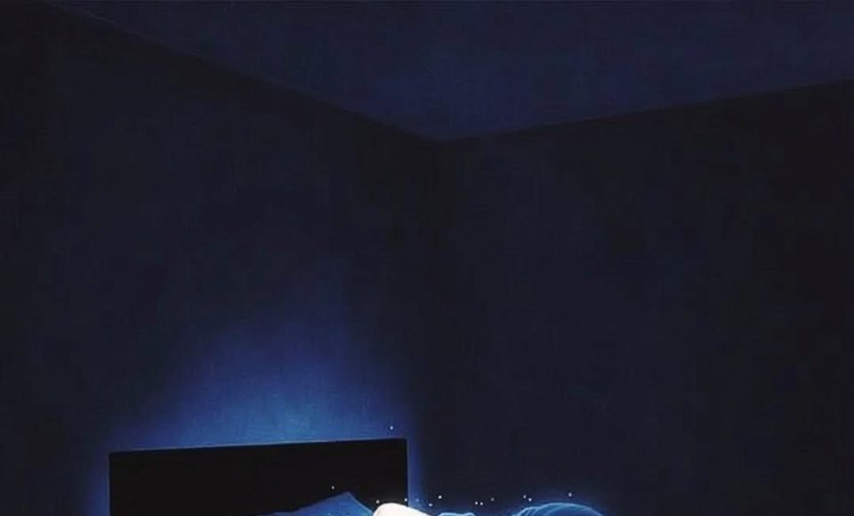 An illustration of an ideal, pitch-black sleep sanctuary for optimal melatonin production.